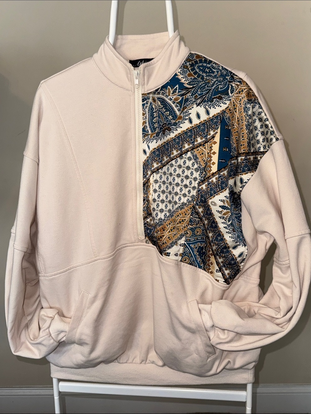 Cream Half‑Zip Pullover with Navy & Gold Paisley Panel